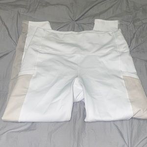 Two pairs of white fabletics powerhold leggings bundle